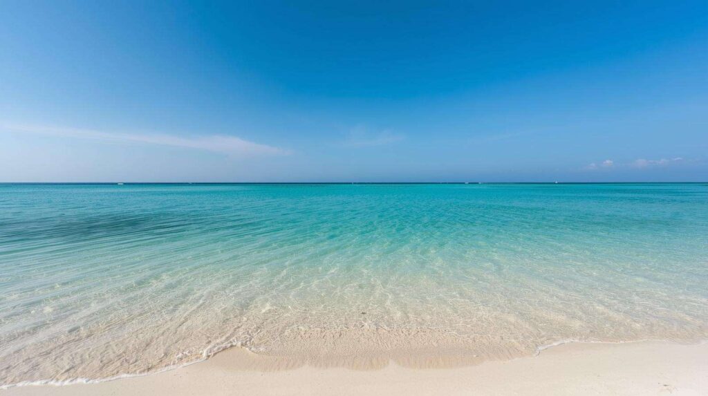 Crystal clear turquoise water and white sand beach at Radhanagar Beach Havelock Island Andaman