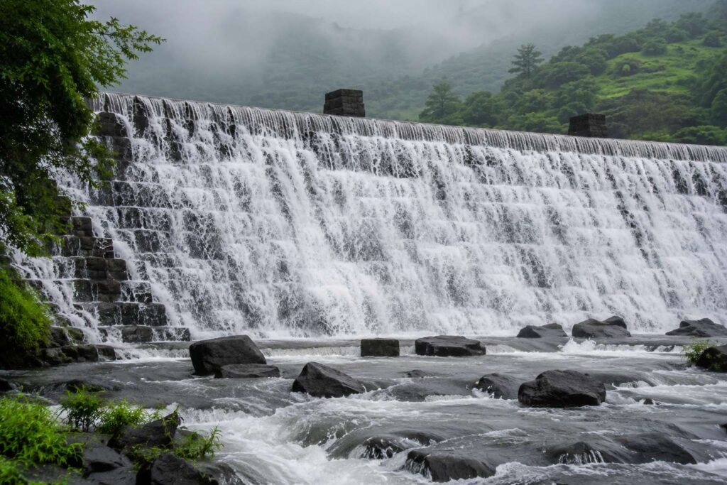 Bhushi Dam Lonavala Maharashtra overflowing during July monsoon season
