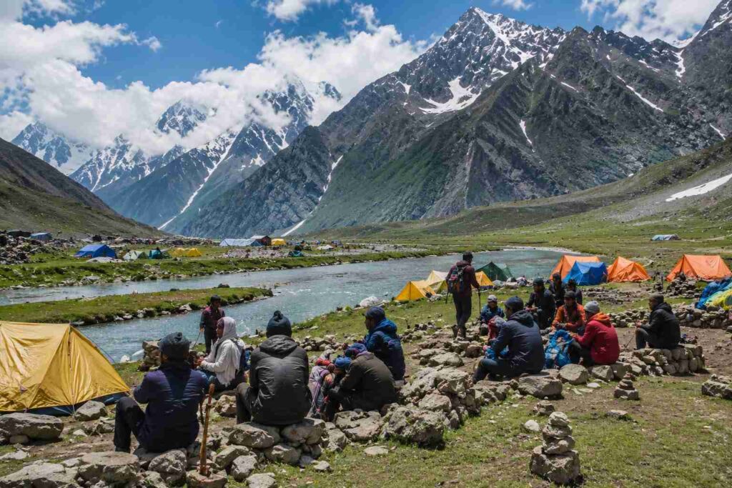 Pilgrims resting at Sheshnag camp on the Pahalgam route